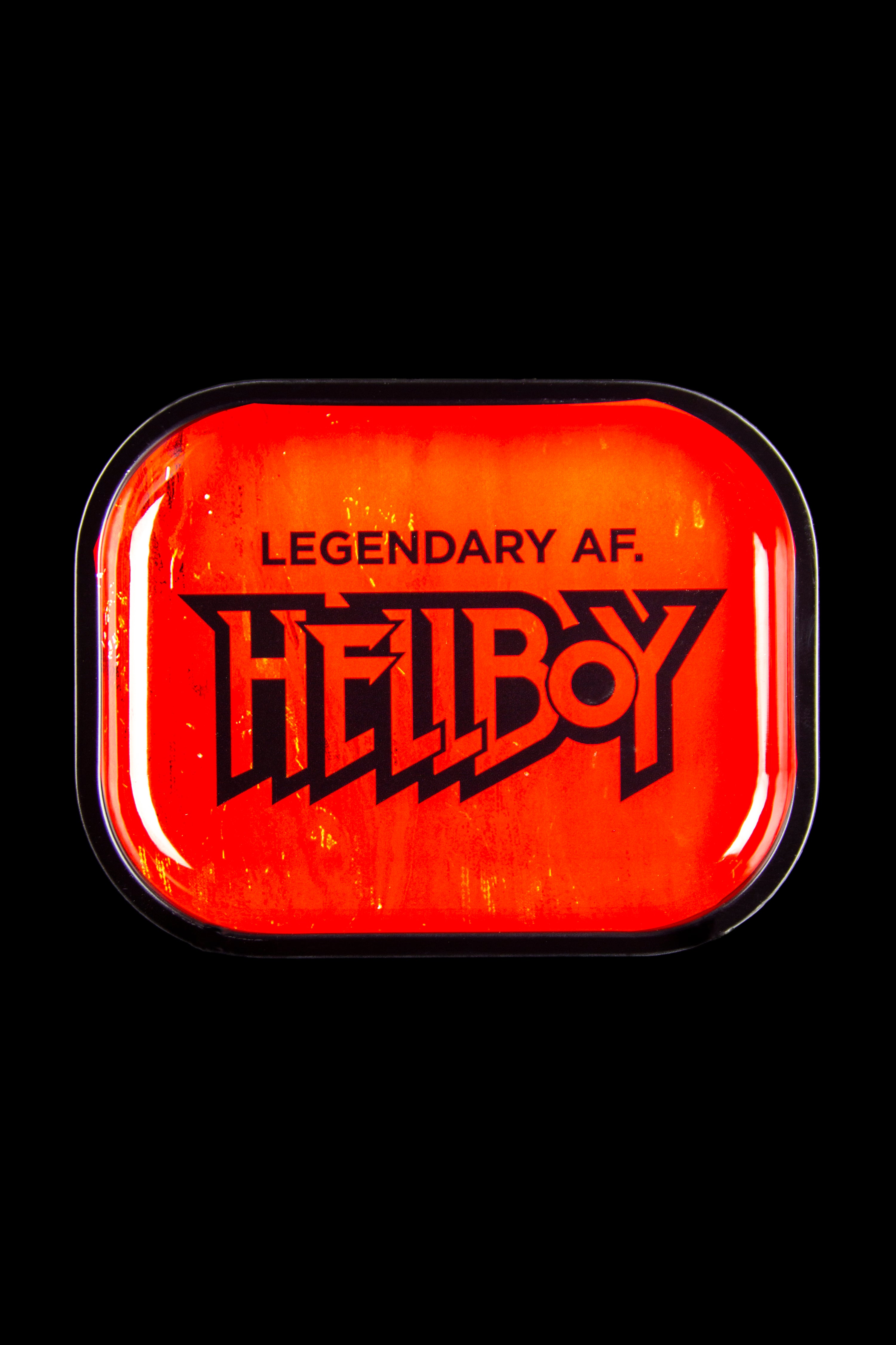 Red metal cannabis storage box with “HELLBOY” logo and “LEGENDARY AF.” text.