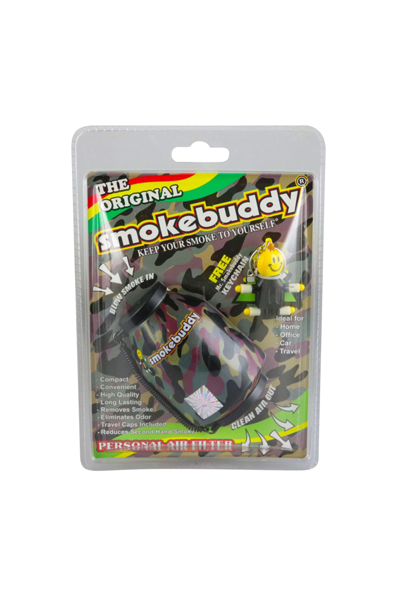 Front-on photo of the camouflage-patterned Smokebuddy Original Personal Air Filter in its plastic blister pack with colorful branding and a smiley keychain.