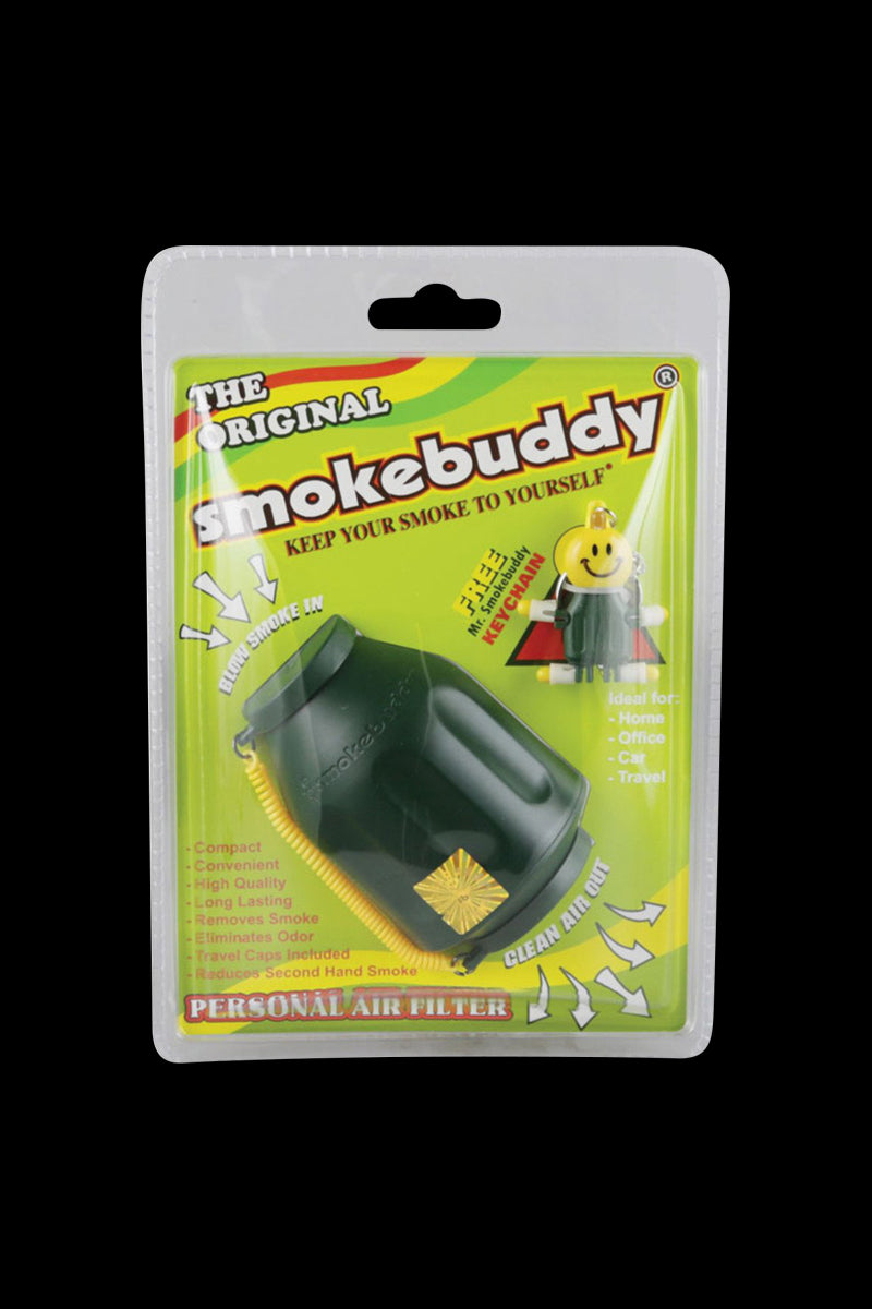 Centered front view of the Smokebuddy Original Personal Air Filter in its blister pack, showing the dark green device against bright yellow packaging.