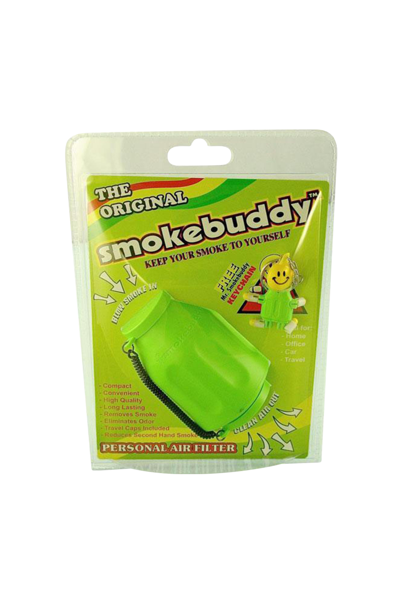 Front-facing shot of the green Smokebuddy Original Personal Air Filter in its blister pack with bold yellow-green branding and a smiley keychain.
