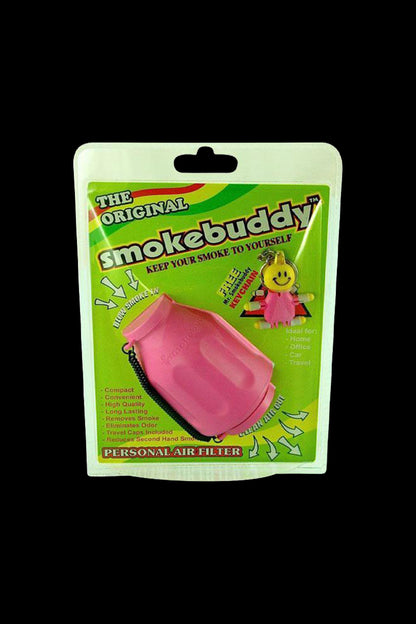 Centered front view of the Smokebuddy Original Personal Air Filter in purple shown in its bright green retail blister pack against a black background