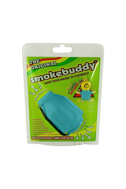 Front-facing shot of the blue Smokebuddy Original Personal Air Filter in its bright green blister-packaging with a smiling keychain visible.