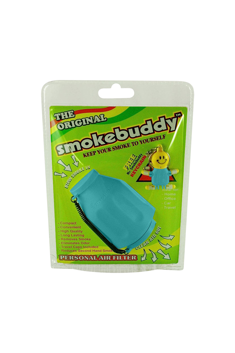 Front-facing shot of the blue Smokebuddy Original Personal Air Filter in its bright green blister-packaging with a smiling keychain visible.