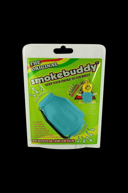 Front-facing shot of the Smokebuddy Original Personal Air Filter in wood grain packaging showing a teal filter mockup on bright green branded card.