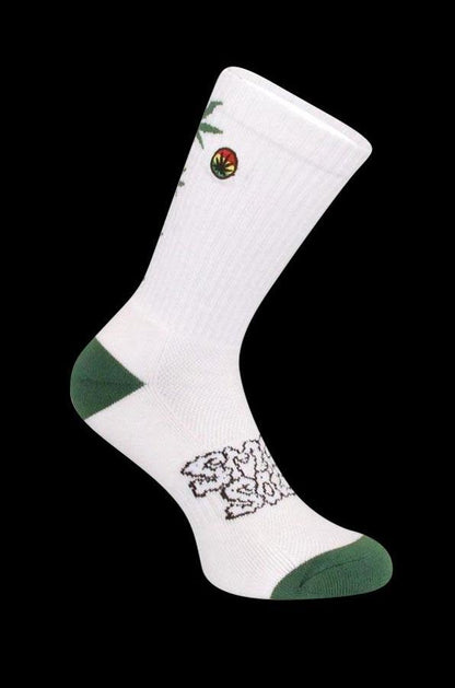 A three-quarter view of the Smokey Brand Socks - Hemp Leaf Ladder, featuring a green toe and heel against a white sock.