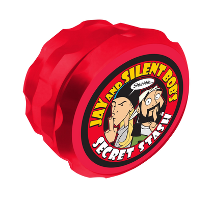 Front view of the Jay and Silent Bob "Secret Stash" Grinder, displaying colorful graphics on a dark background.