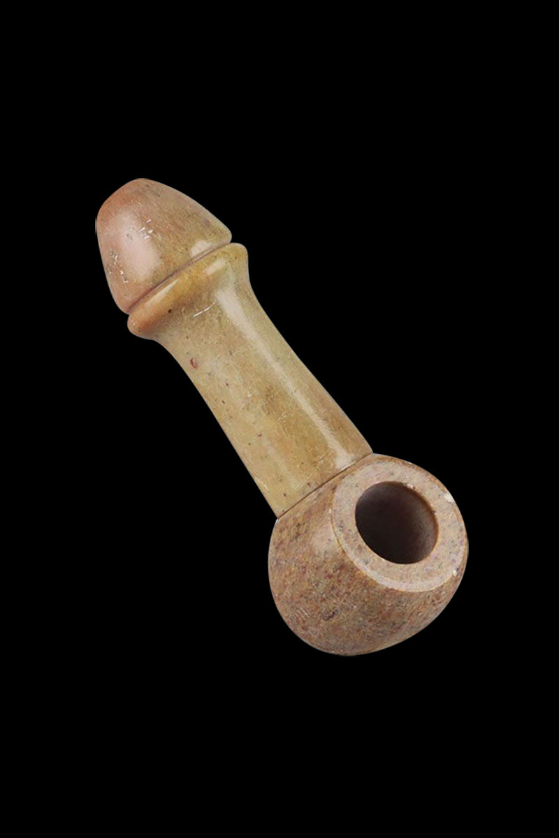 A side view of the Stone Carved Penis Pipe, showing the carved stone material and unique sculptural form.