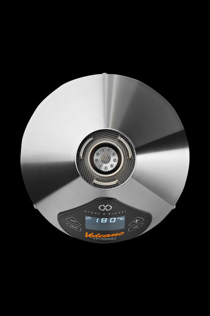 Front view of the Storz & Bickel Volcano Hybrid Vaporizer, displaying a digital temperature readout on its metallic surface.