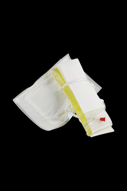 A slightly angled overhead view of the Synthetix5 Fetish Urine Belt Kit, showcasing its plastic construction and contained pouch.