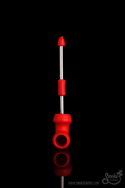 Red dab tool with spherical accents against a black background.
