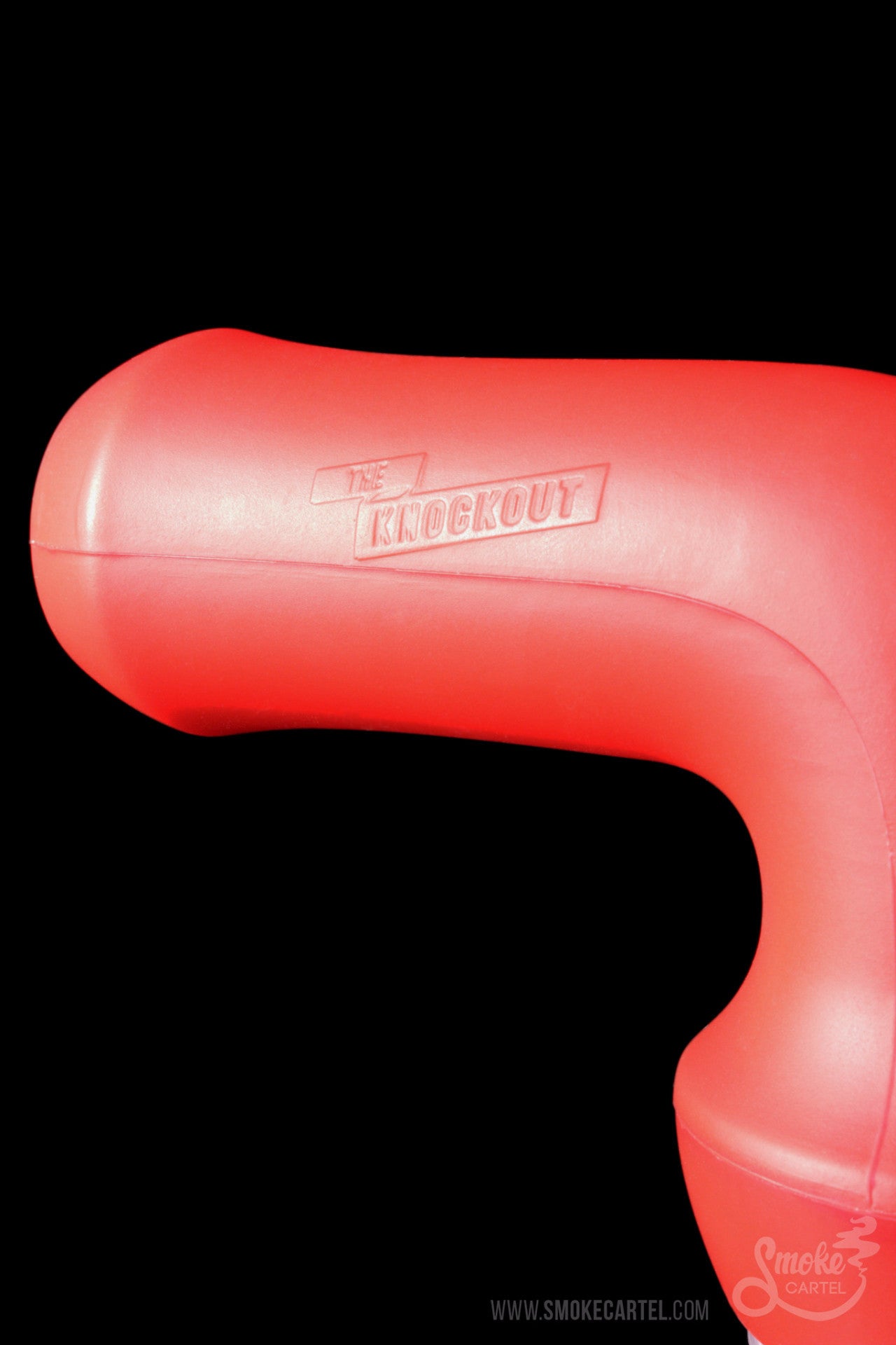 Red silicone dab torch with "Knockout" branding, isolated on a black background.