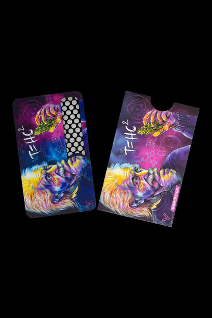 Two colorful, illustrated cannabis accessory cases featuring a whimsical lion design with psychedelic patterns and the text "THC²." One case has a patterned, textured surface, while the other is smooth and labeled "NON-STICK."