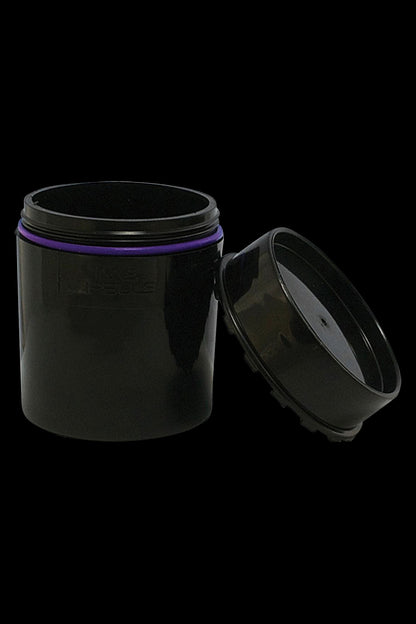 A slightly angled, close-up view of the open “Time Capsule” Sealable Storage Device, revealing a dark interior and smooth, rounded form.