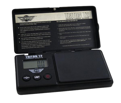 A close-up, angled view of the MyWeigh Triton T2 120g scale, displaying instructions on its open lid.