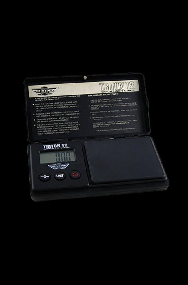 A top-down view of the MyWeigh Triton T2 200g x 0.01g Scale with a black surface and digital display, showing its compact design.