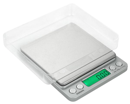 A close-up, top-down view of the Truweigh Enigma Digital Mini Scale with a sleek, silver finish and digital display.