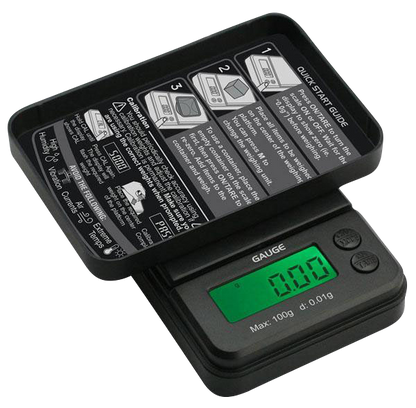 A close-up, angled view of the Truweigh Gauge Digital Mini Scale, displaying a reading on its digital screen.