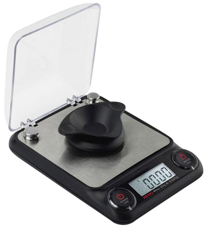 A close-up shows the Truweigh Xeno Digital Milligram Scale with a digital display, set against a dark background.