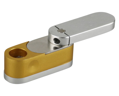 A side view of the Two Tone Metal Twist-Out Pipe with Storage, showing its silver and gold tones and closed twist-out mechanism.