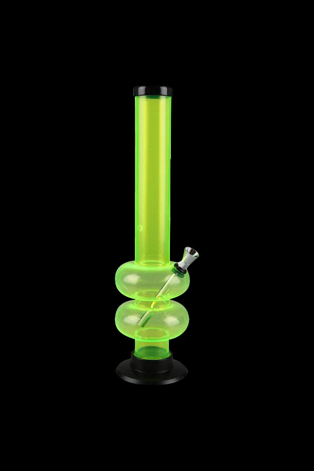 Green acrylic water pipe (bong) on a black background.