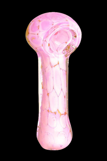 Pink glass smoking pipe.