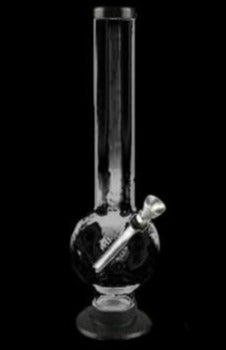 Glass bong against a black background.
