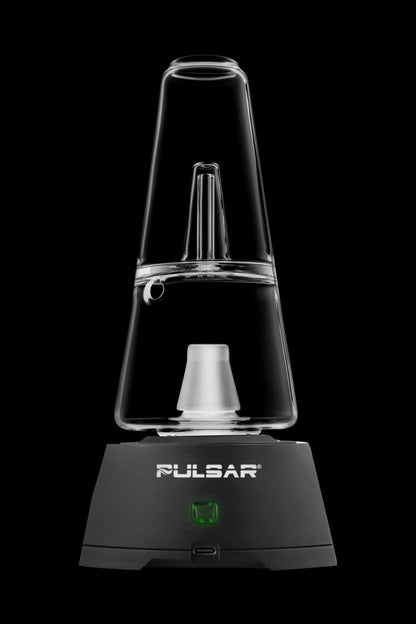 Black and clear electronic dab rig with a glass water pipe attachment, branded “Pulsar.”
