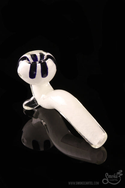 A studio shot of the White Fritted Sherlock with Black 'Daisy' Fritted Bowl, showcasing its patterned glass and curved design.