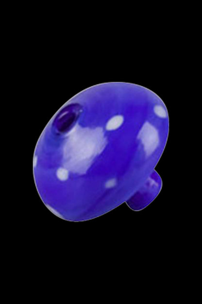 A close-up of the Worked Mushroom Carb Cap, showing its smooth, rounded form against a dark background.