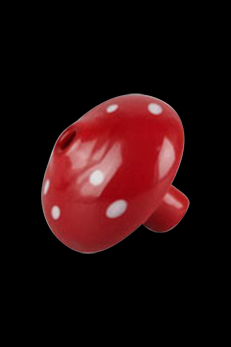 The Worked Mushroom Carb Cap is pictured as a close-up, angled view of the red, rounded cap.