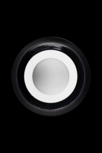 Black cannabis oil cartridge with white mouthpiece.