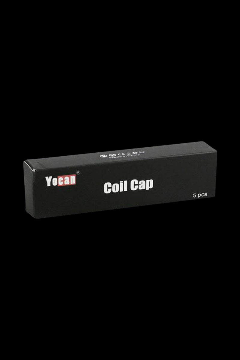 A close-up of the box containing Yocan Evolve Plus XL Coil Caps, displaying the packaging's branded design and contents.