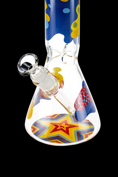 Front view of the Famous Brandz "Papaya" Glass Beaker Ice Bong, showcasing its colorful, patterned glass design and classic beaker shape.