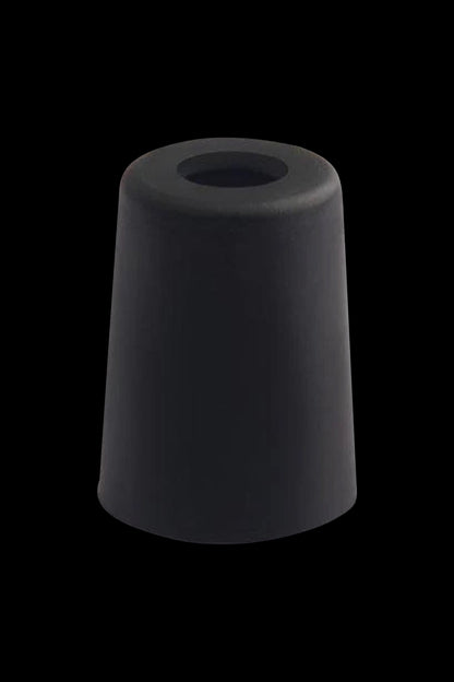 A close-up, angled view of the Airistech Dabble Glass Connector/Adapter, showcasing its smooth, dark glass construction.