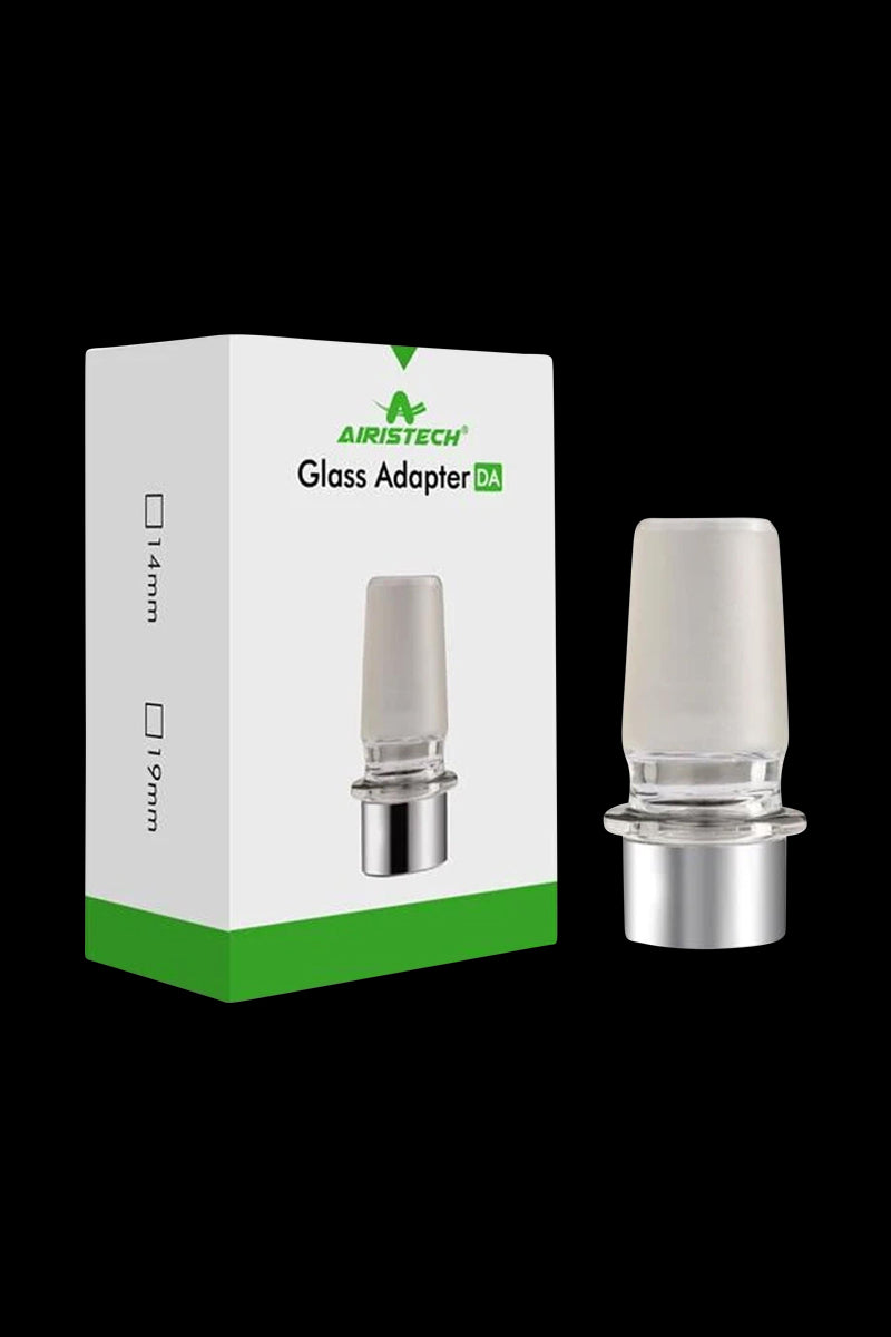 A close-up of the Airistech Dabble Glass Connector/Adapter, showing its clear glass construction and cylindrical shape against a plain background.