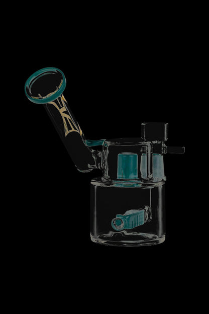 A three-quarter view of the Evolution Morning Glory Sidecar Dab Rig, showcasing its clear glass construction and unique sidecar attachment.