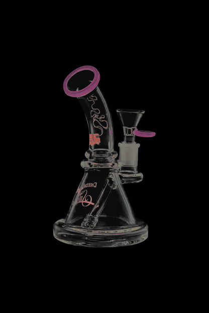 A slightly angled studio shot of the Cheech & Chong Strawberry Mini Beaker Bong with a clear glass construction.