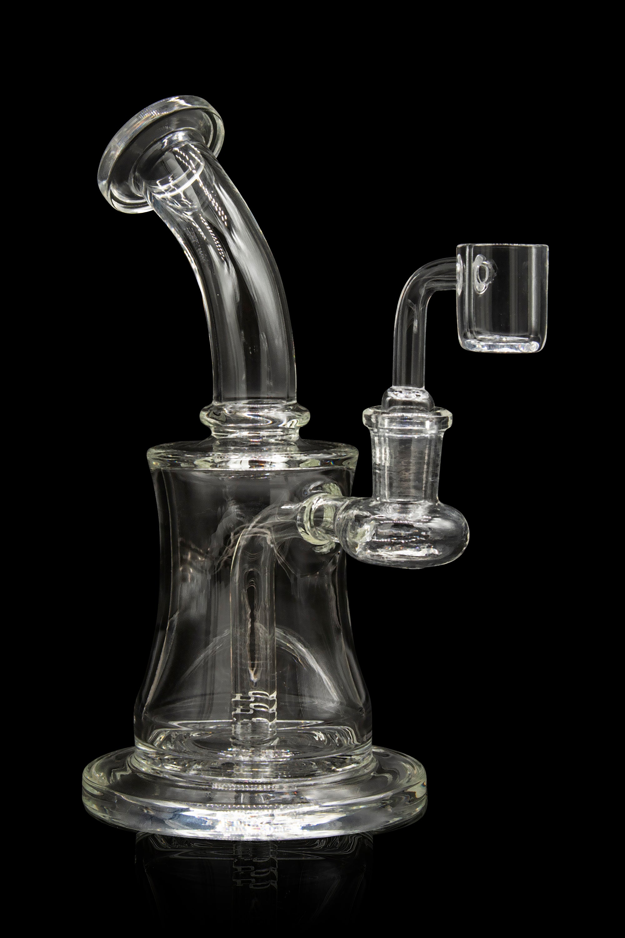 Clear glass water pipe (rig) with a quartz banger, isolated on a black background.