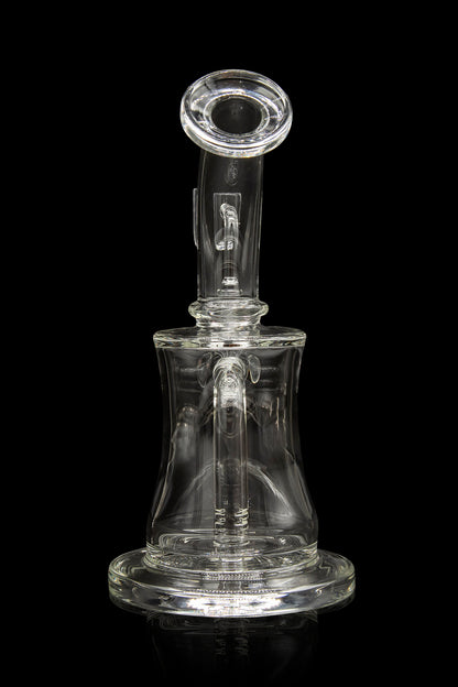 Clear glass dab rig with intricate design, isolated on black.