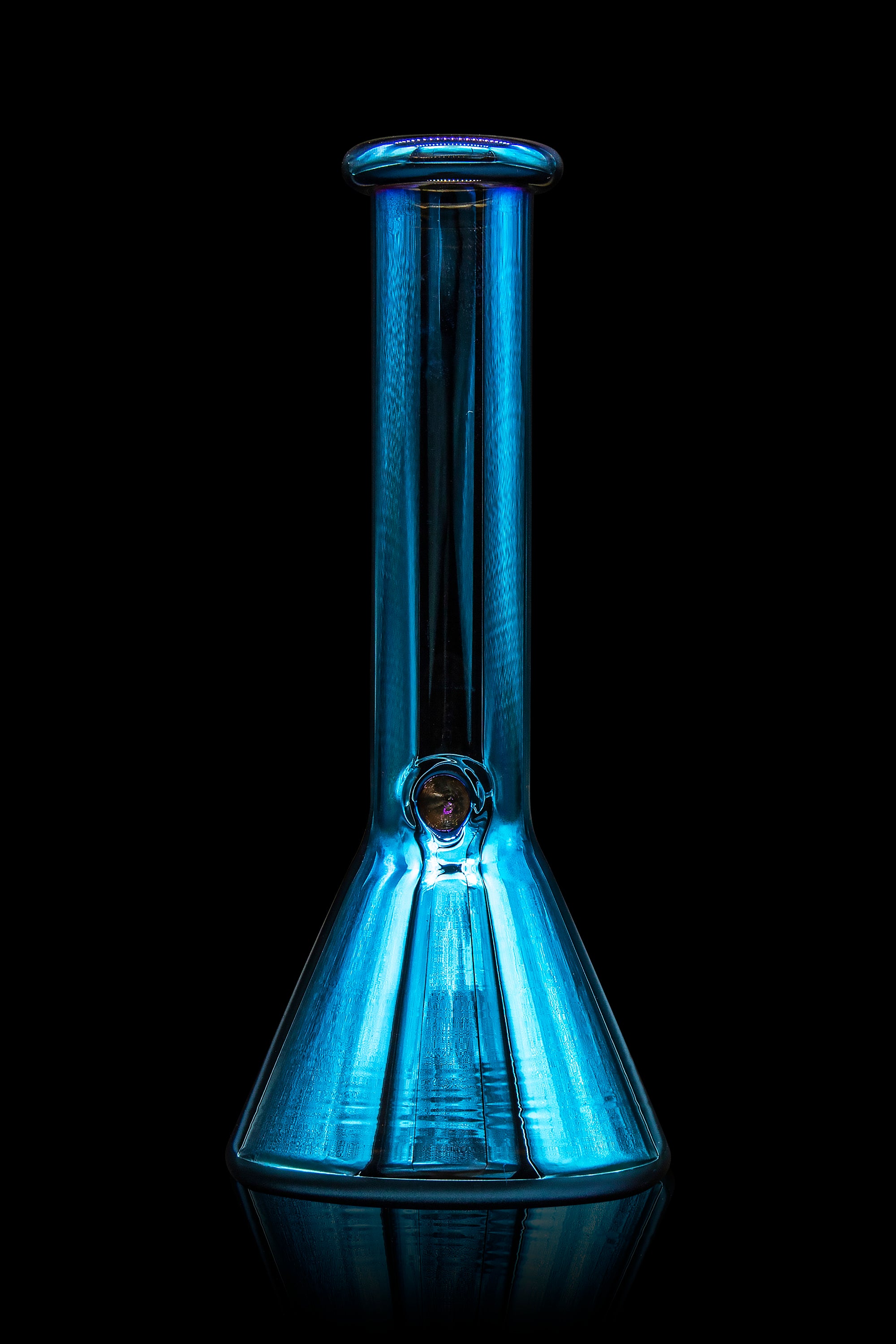 Blue glass bong illuminated against a black background.