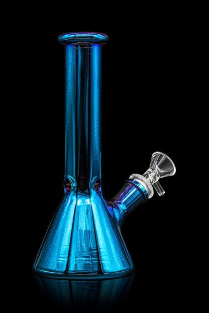 Blue glass bong isolated on a black background.