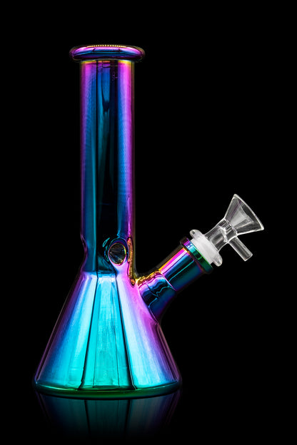 Iridescent glass water pipe, also known as a bong, with a clear glass bowl, isolated on black.