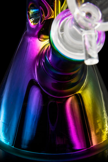Iridescent glass cannabis water pipe with swirling colors and abstract reflections.