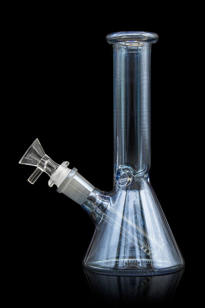 Glass bong with a clear, conical base and angled neck, isolated on a black background.