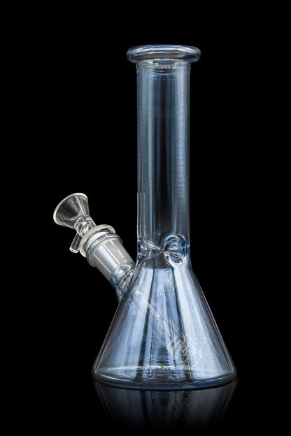 Clear glass bong with a downstem against a black background.