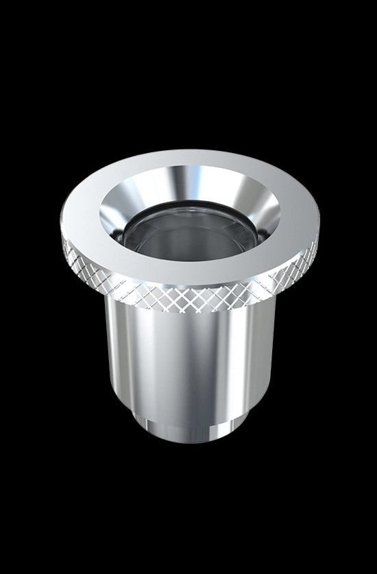 Silver cannabis concentrate container with textured grip.