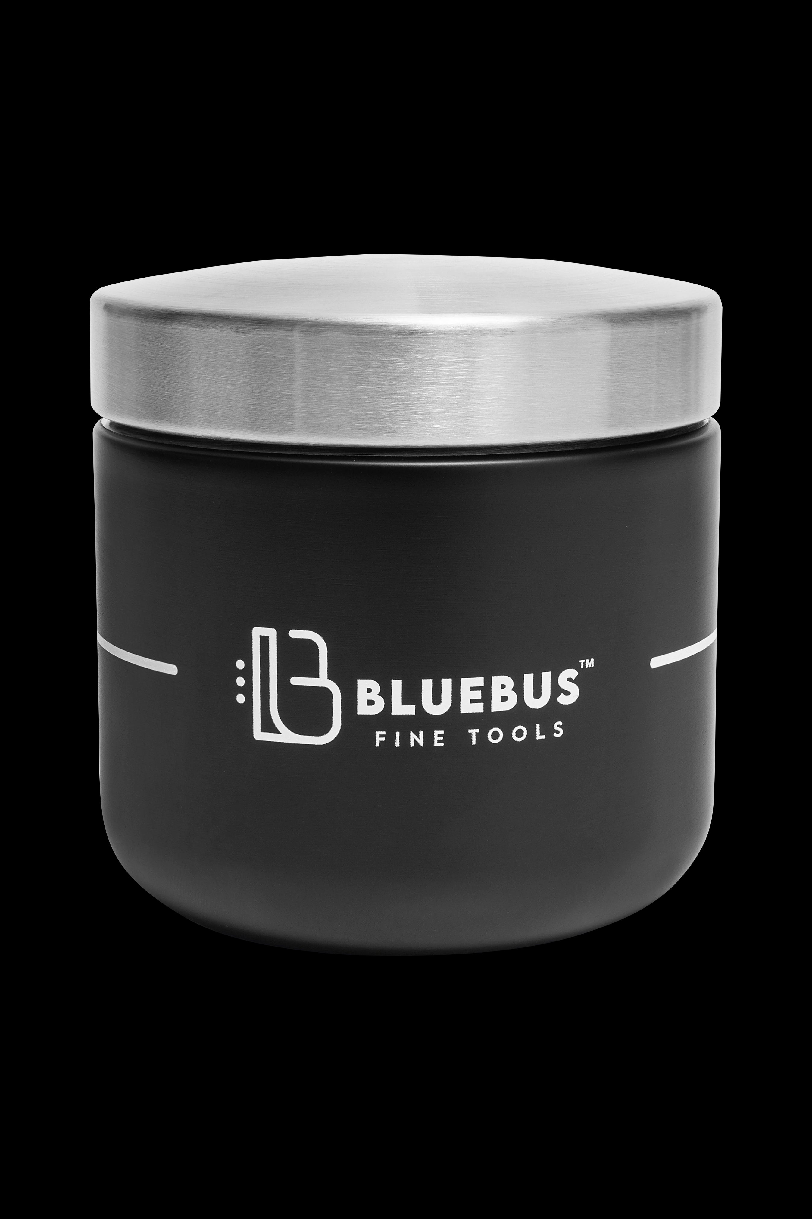 Black airtight jar with silver lid and “Bluebus Fine Tools” logo, likely for cannabis storage.