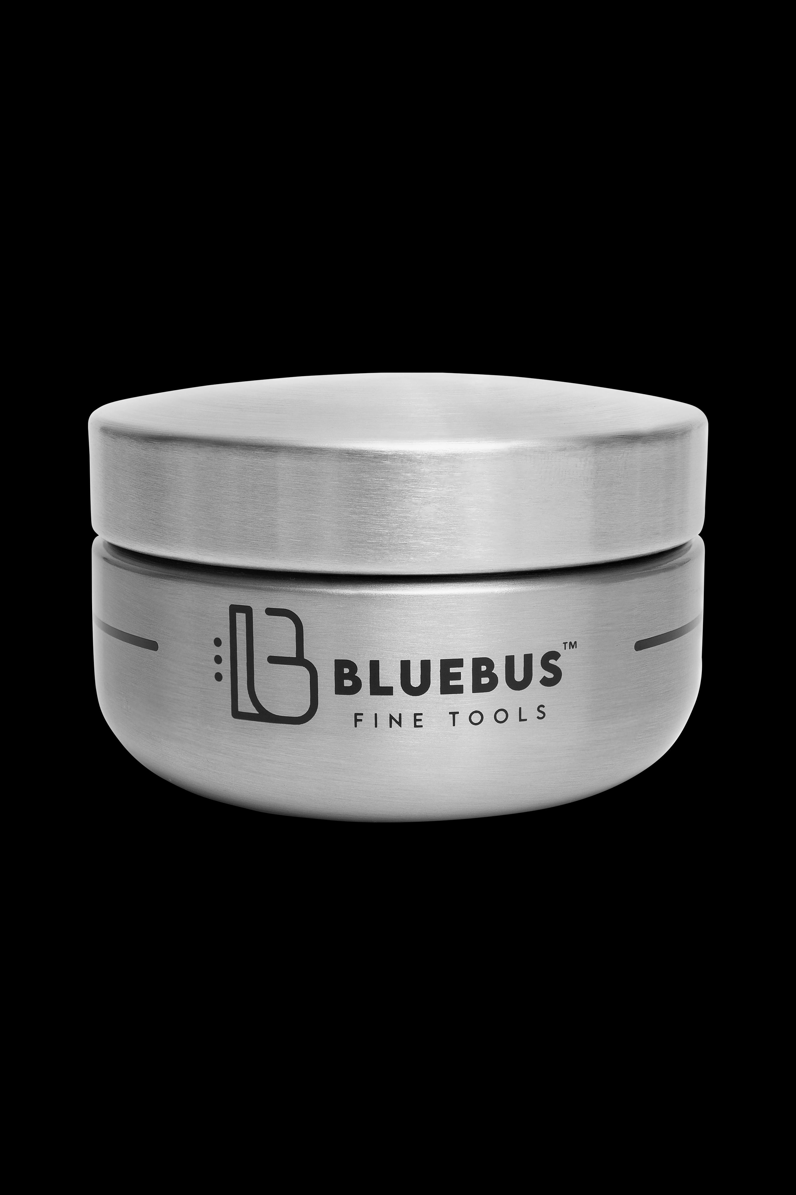 Silver jar labeled “Bluebus Fine Tools” likely containing cannabis concentrates.