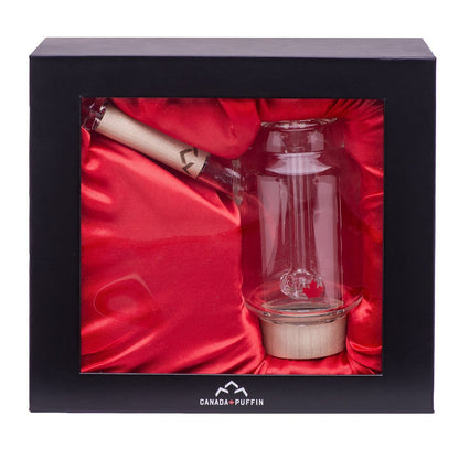 Front view of the Canada Puffin Arctic Bubbler against a vibrant red backdrop, showcasing its sleek glass design.