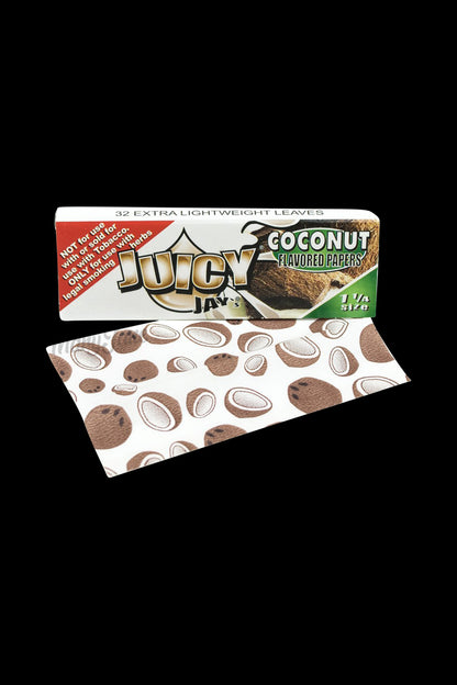 A close-up of Juicy Jay's 1 1/4 Coconut Rolling Papers package with a colorful design, angled slightly to showcase the branding.